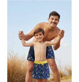 Maillot de bain pour enfant avec motifs de palmiers et de planches de surf